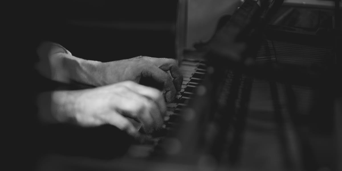 Pablo Devigo’s hands playing a harpsichord during the recording session of Still Life (Deux-Elles, 2025)